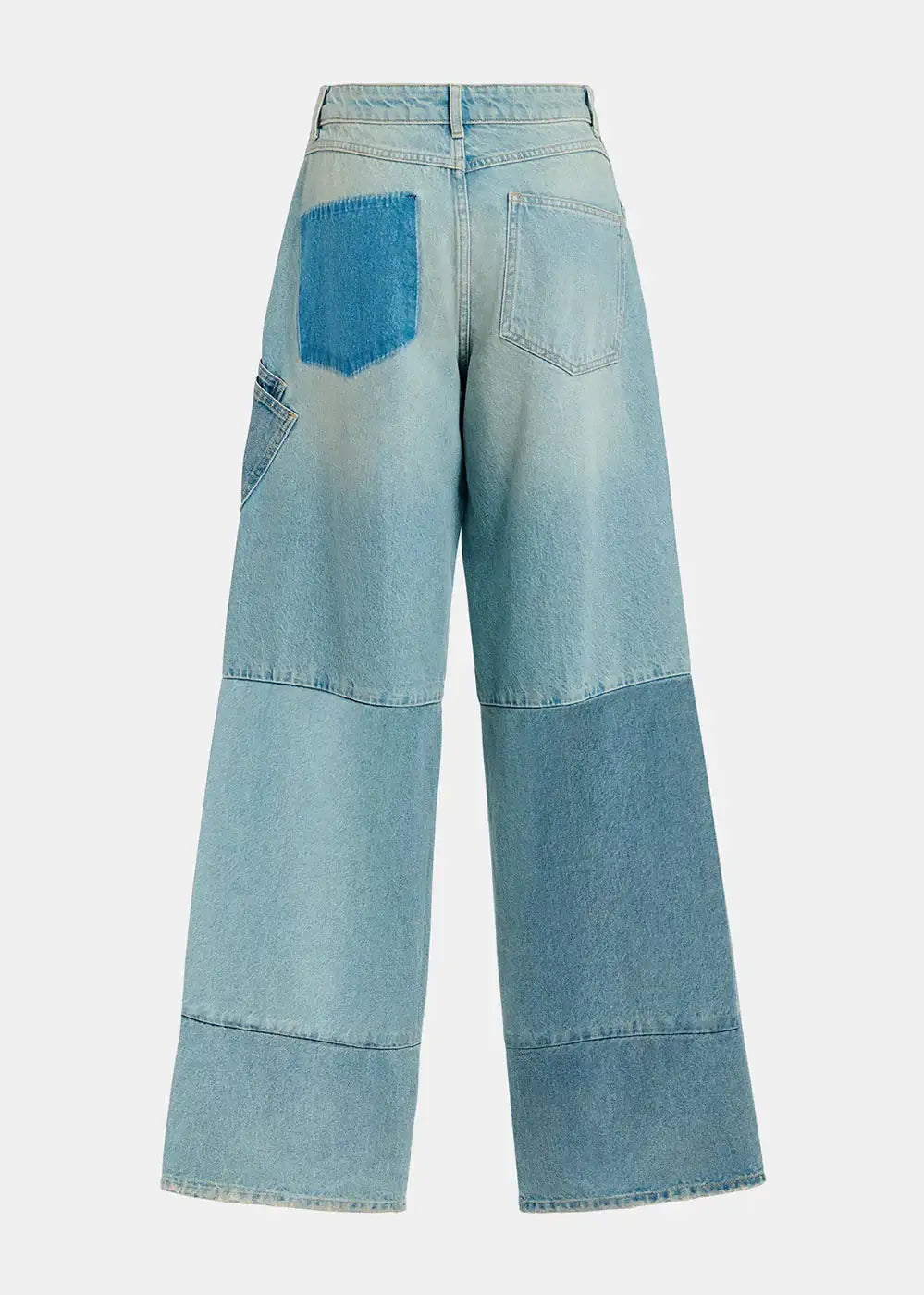 Wide leg patchwork jeans in light blue denim, rear view, color block detail, fashion pants