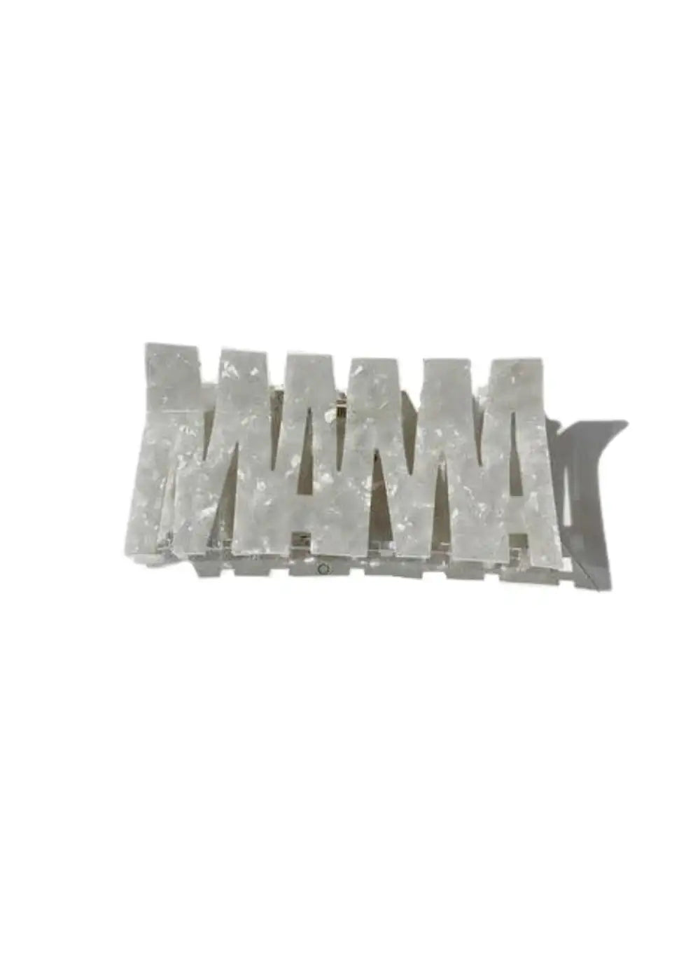Pearl acrylic hair clip spelling MAMA on white background