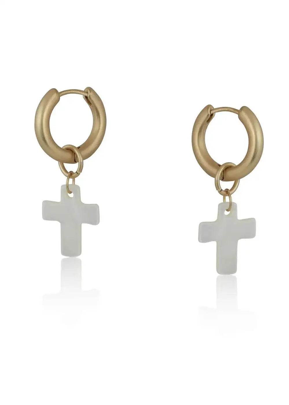 Gold-tone huggie hoop earrings with white cross pendants on white background