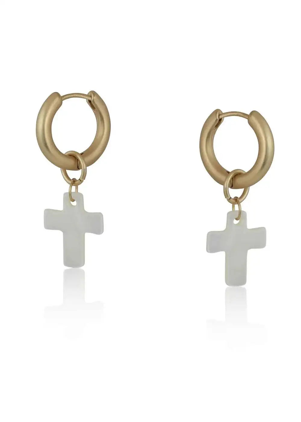 Gold-tone huggie hoop earrings with white cross pendants on white background