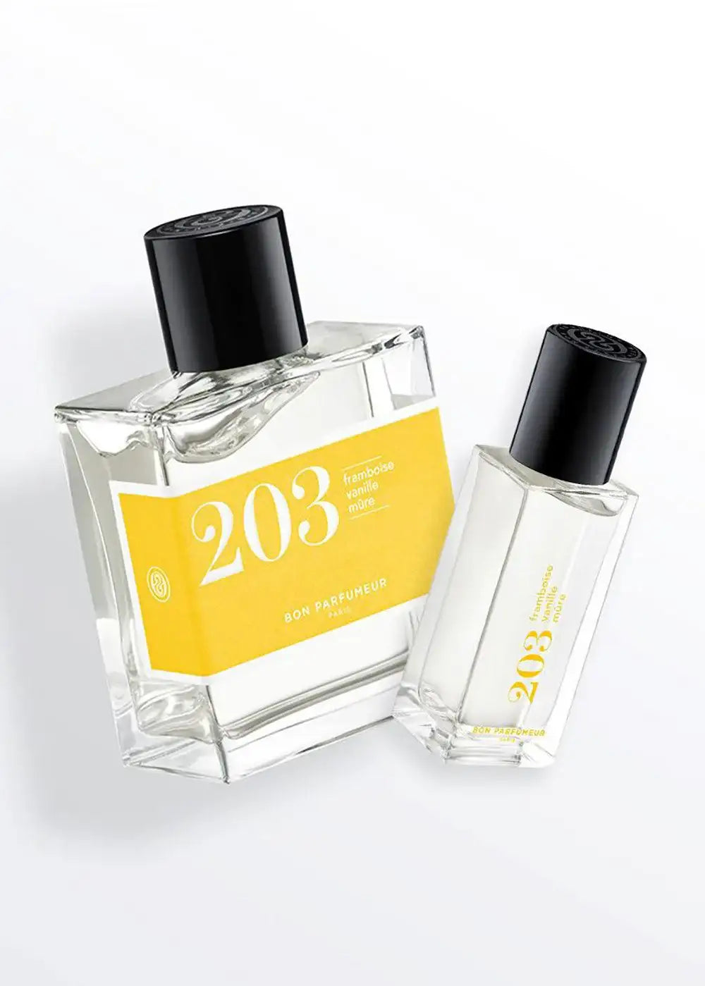 Two Bon Parfumeur 203 perfume bottles with yellow labels on a white background