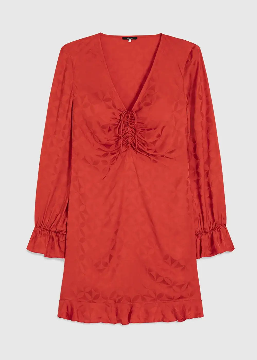 Red mini dress with long sleeves, ruched bust, subtle geometric pattern, and ruffle trim