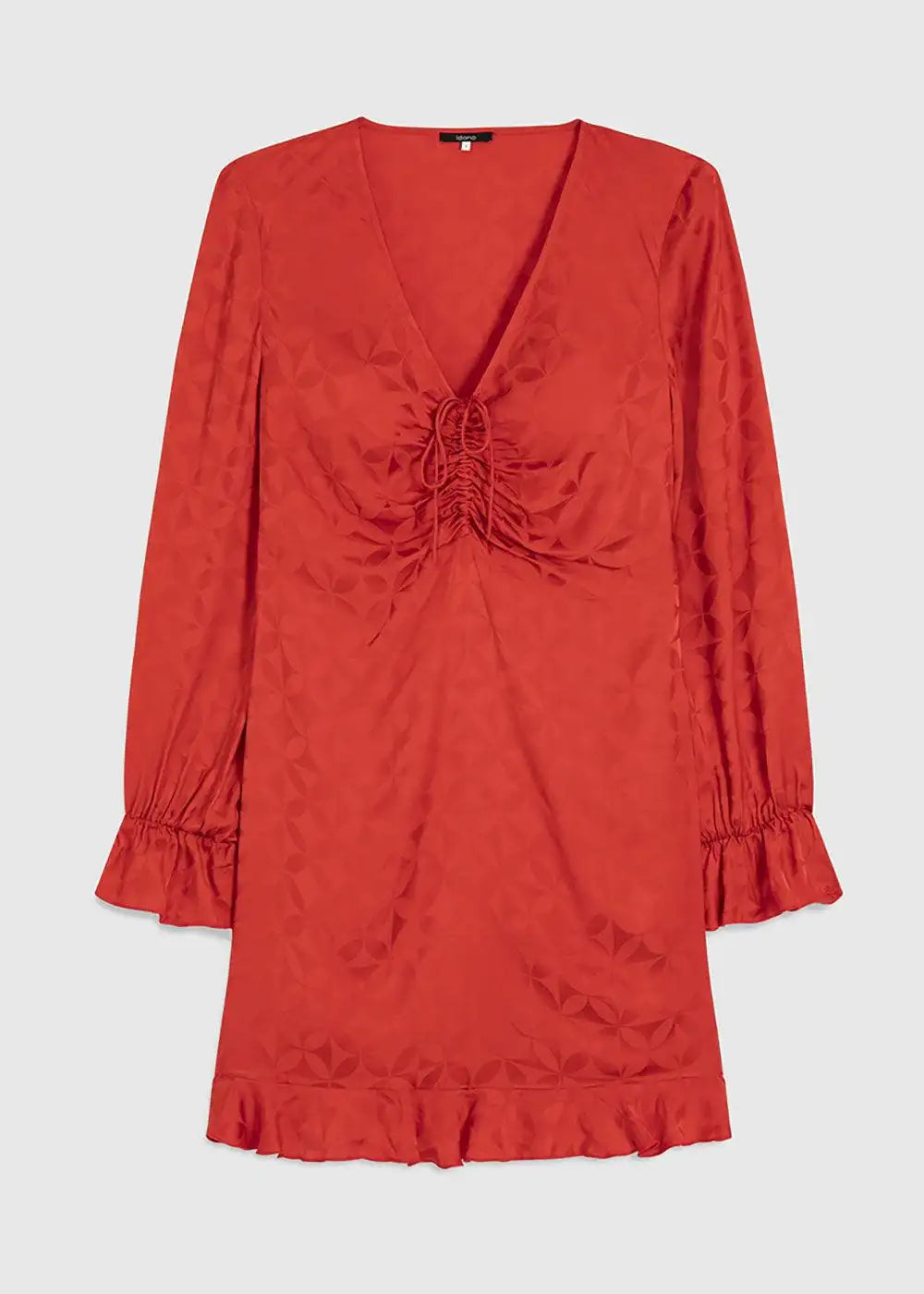 Red mini dress with long sleeves, ruched bust, subtle geometric pattern, and ruffle trim