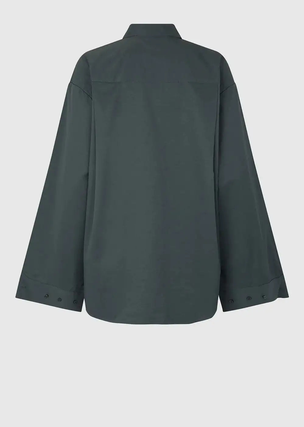 Back view of dark green oversized women's shirt with long sleeves and buttoned cuffs