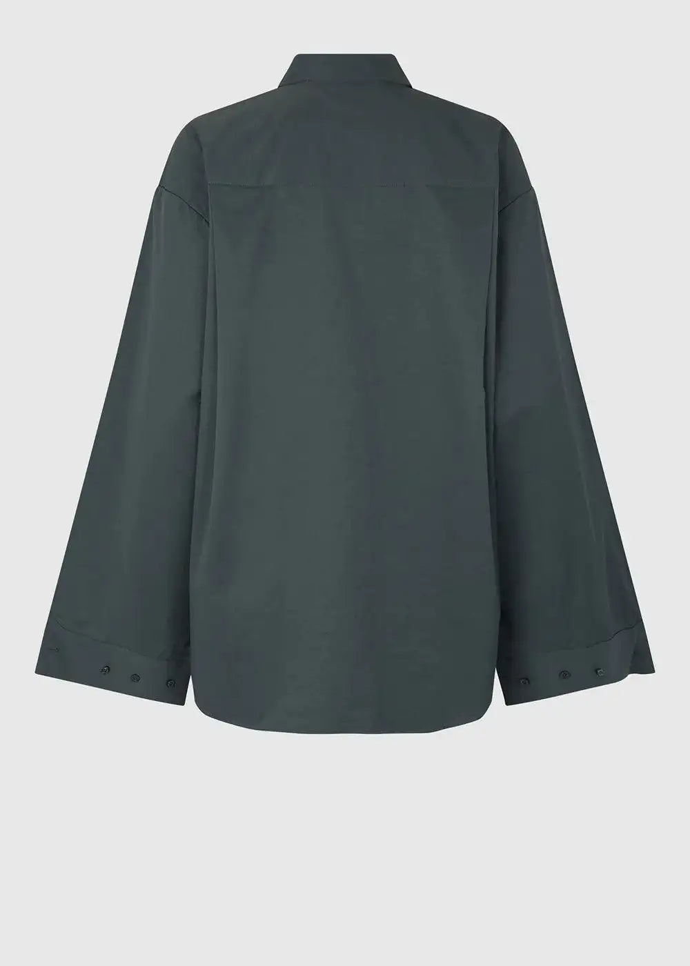 Back view of dark green oversized women's shirt with long sleeves and buttoned cuffs
