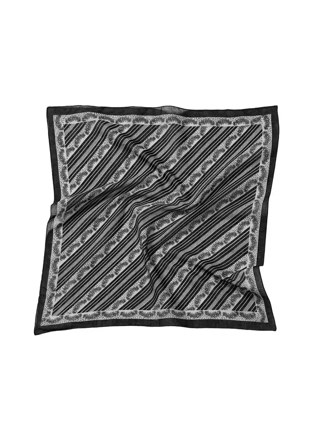 Black and white patterned silk scarf with diagonal stripes and floral border