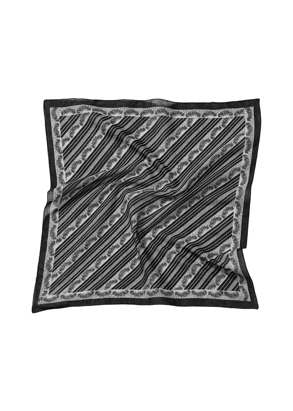 Black and white patterned silk scarf with diagonal stripes and floral border