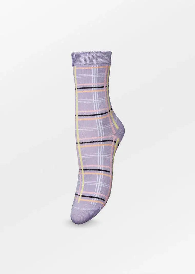 Lilac check patterned sock with yellow, white, and black plaid design on white background