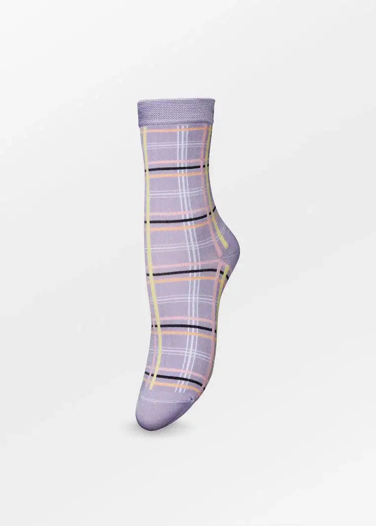 Lilac check patterned sock with yellow, white, and black plaid design on white background