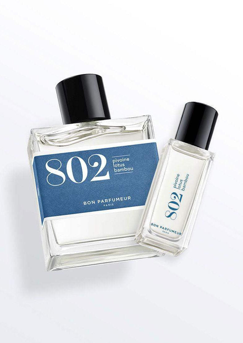 802 pivoine lotus bambou perfume bottles with minimalist blue labels and black caps