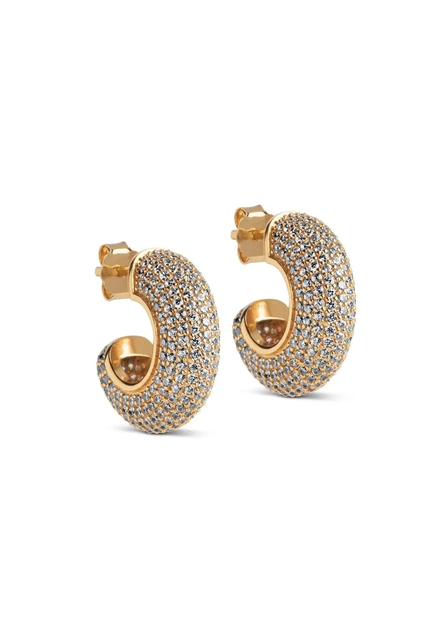 Gold hoop earrings with sparkling pavé crystals on a white background