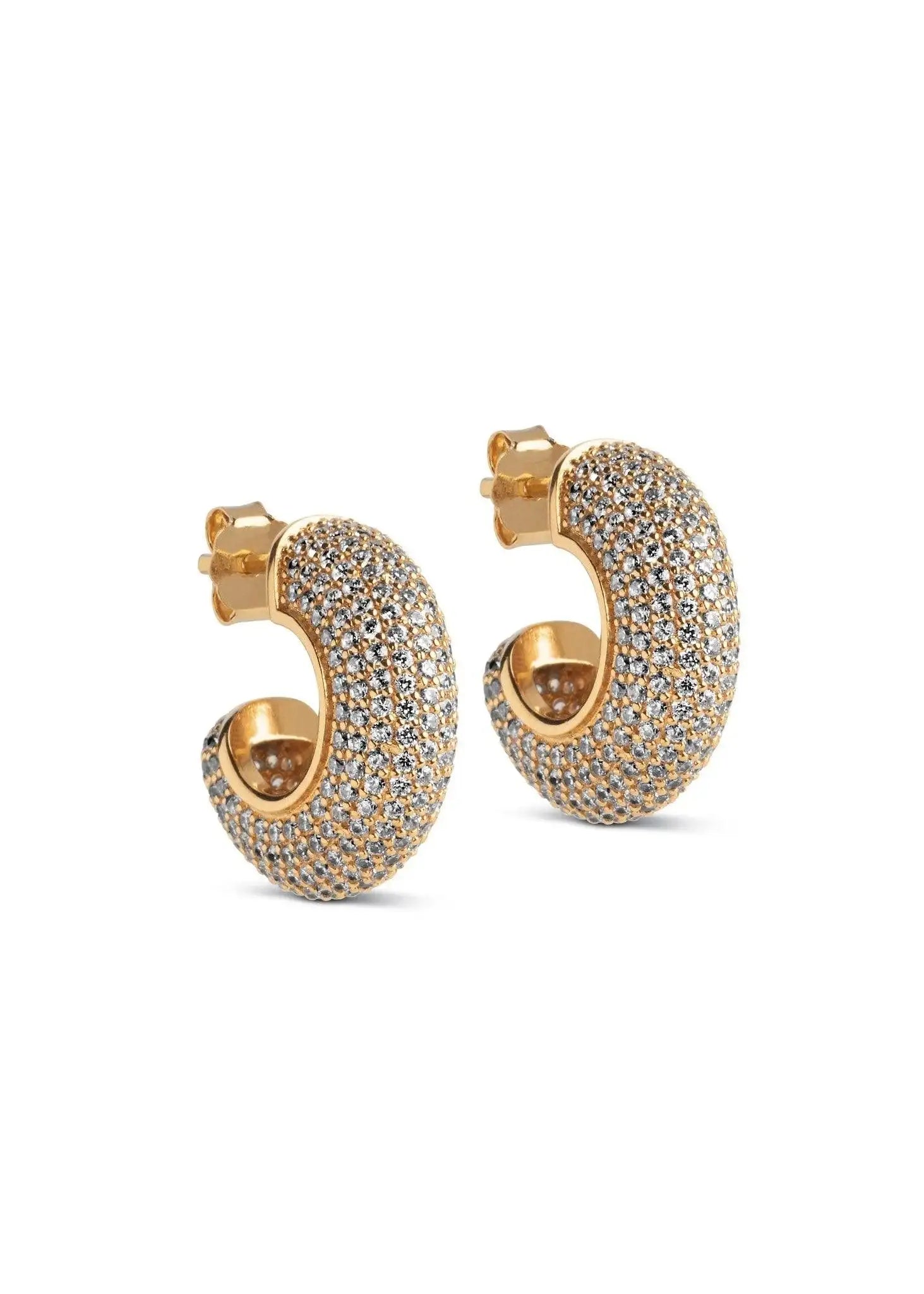 Gold hoop earrings with sparkling pavé crystals on a white background