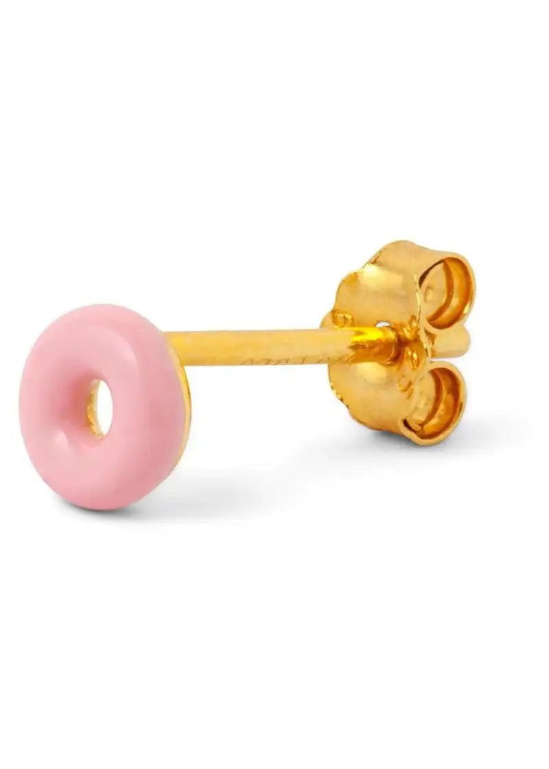 Gold stud earring with light pink enamel donut shape on white background