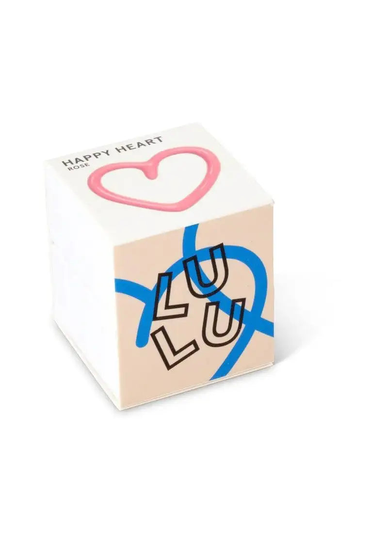 Small cube box with a pink heart design and bold LULU lettering, minimal packaging style