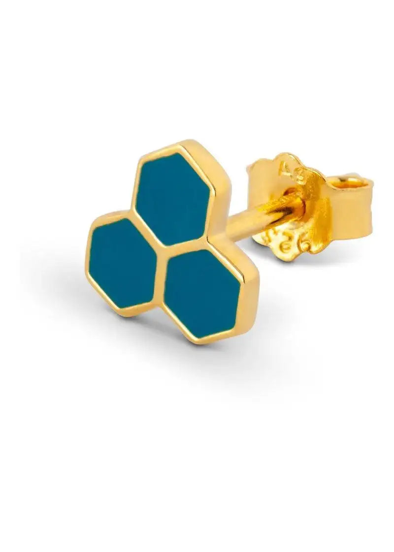 Gold stud earring with three blue hexagon shapes on white background, modern jewelry