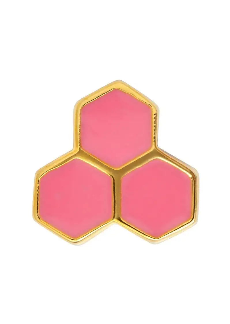 Gold and pink hexagon stud earring with modern geometric design, close-up on white background