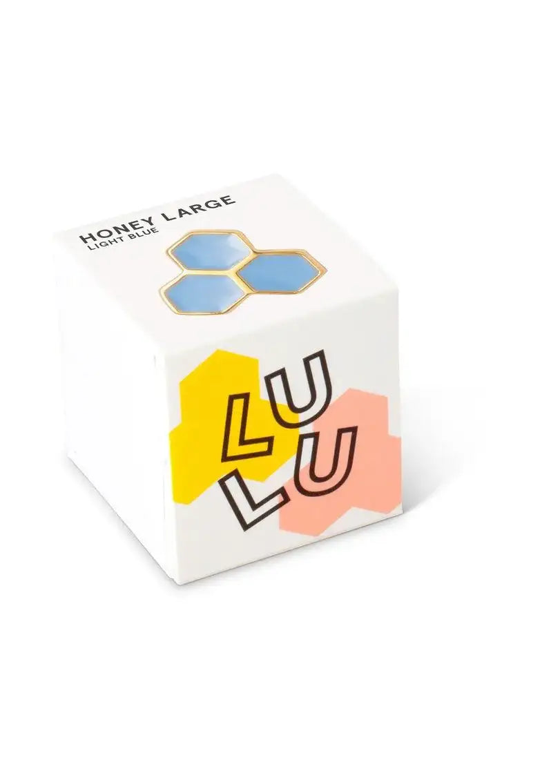 Box with honeycomb style light blue large stud earring, modern packaging design