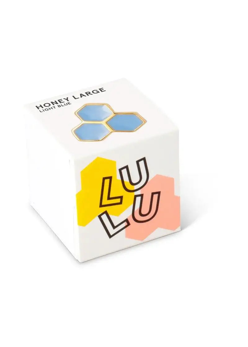 Box with honeycomb style light blue large stud earring, modern packaging design