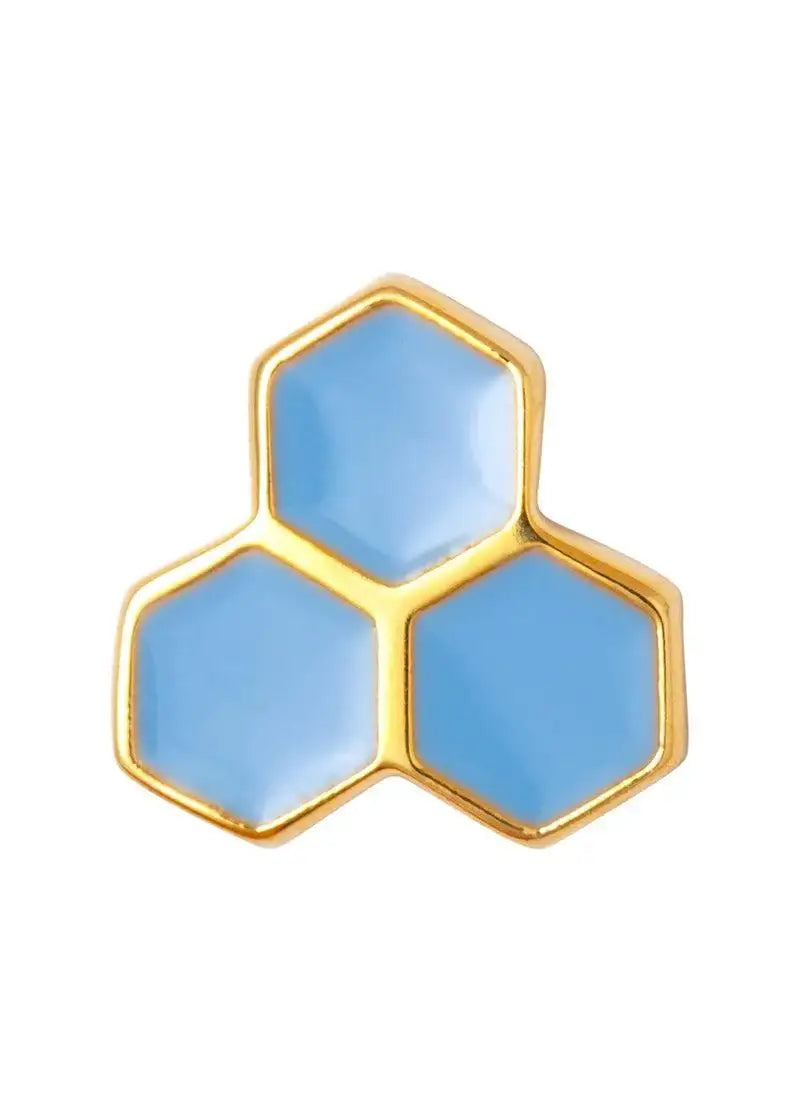 Gold and blue hexagonal stud earring with honeycomb design on white background