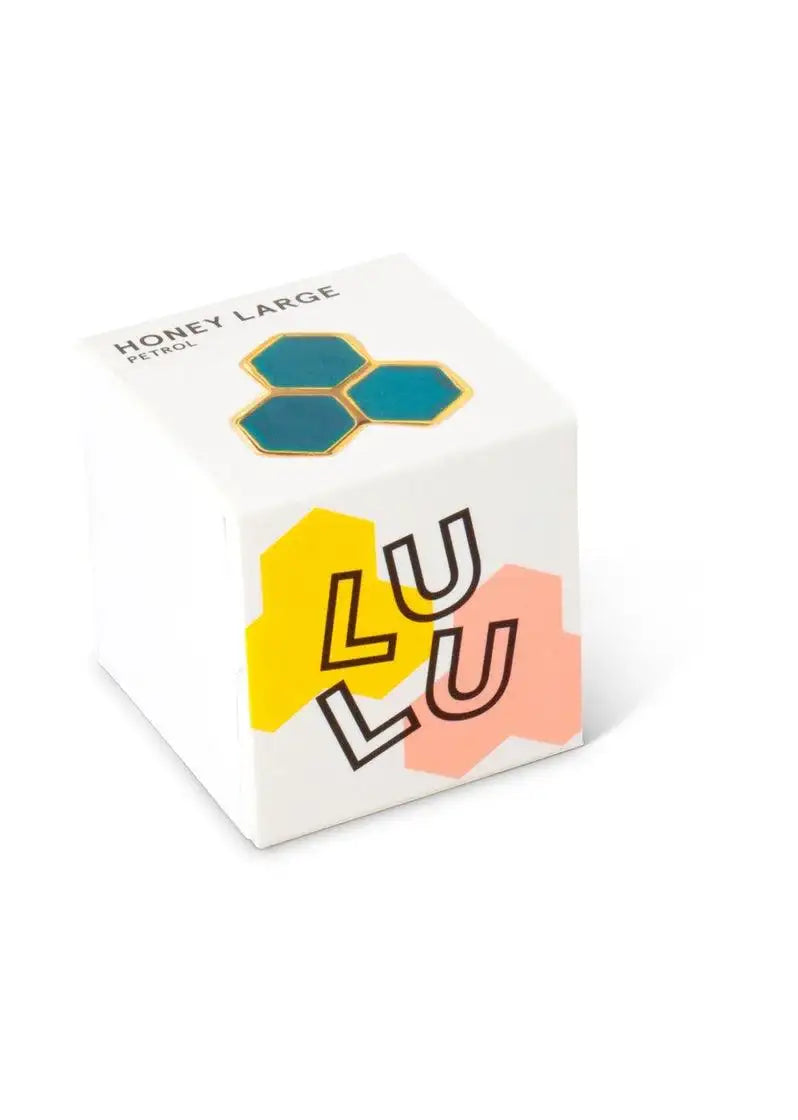 Box with honeycomb design and geometric teal stud earring, labeled Honey Large Petrol.