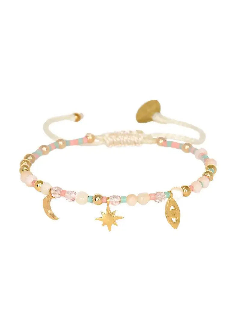 Colorful beaded bracelet with gold moon, star, and eye charms on adjustable cord