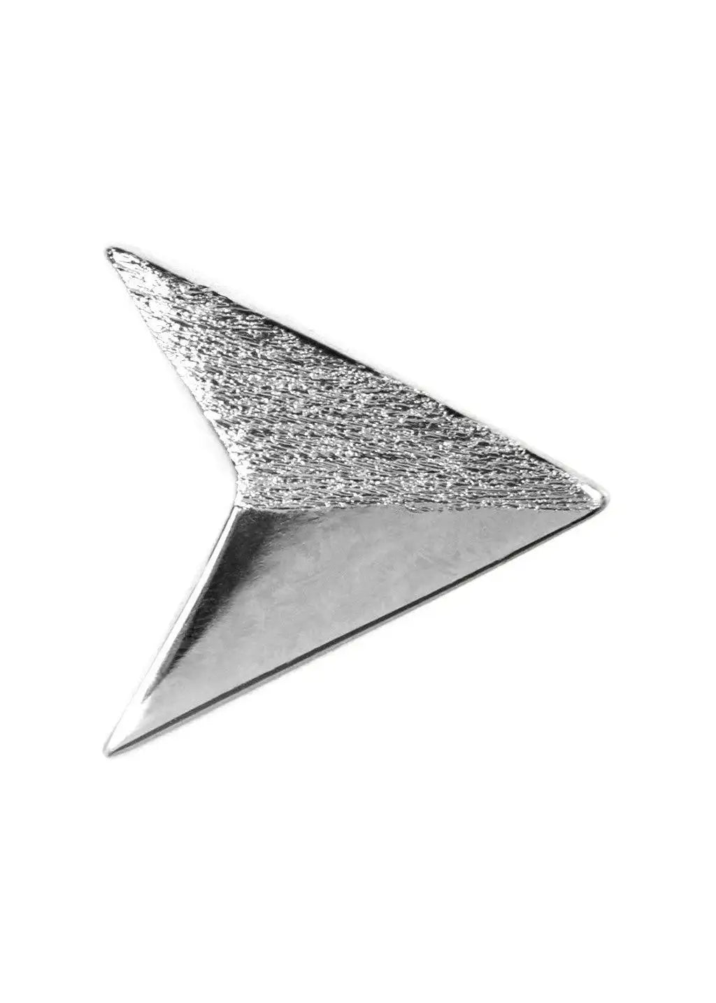 Silver paper plane stud earring with textured detail on white background