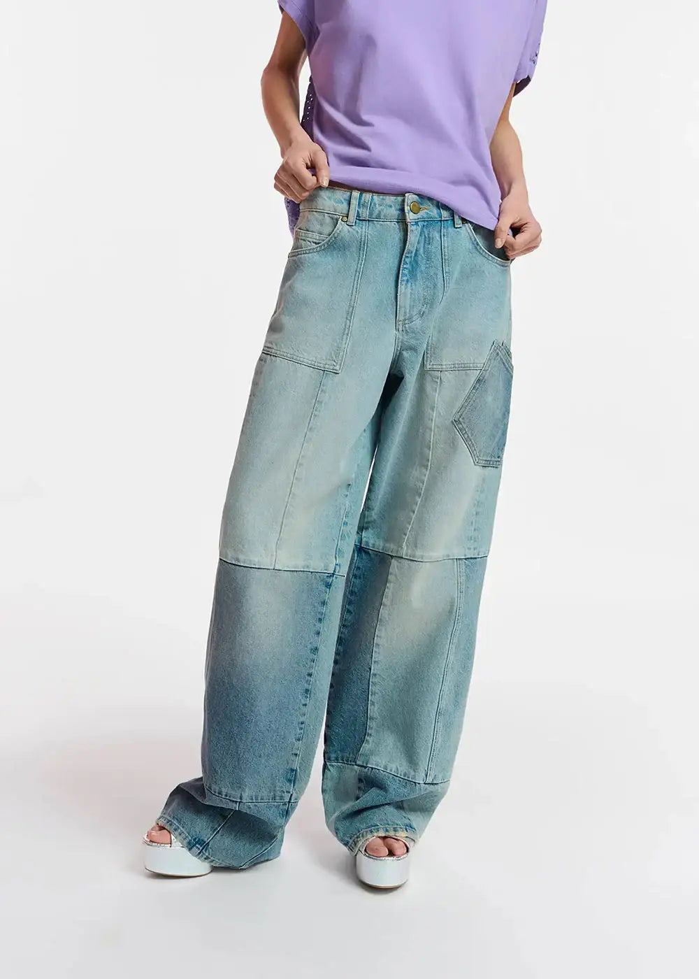 Wide leg patchwork jeans with faded wash, styled with lilac t-shirt and platform sandals