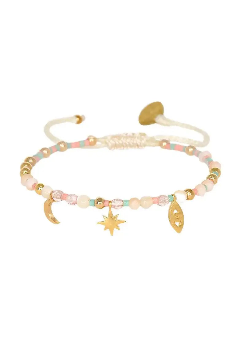 Colorful beaded bracelet with gold moon, star, and eye charms on adjustable cord
